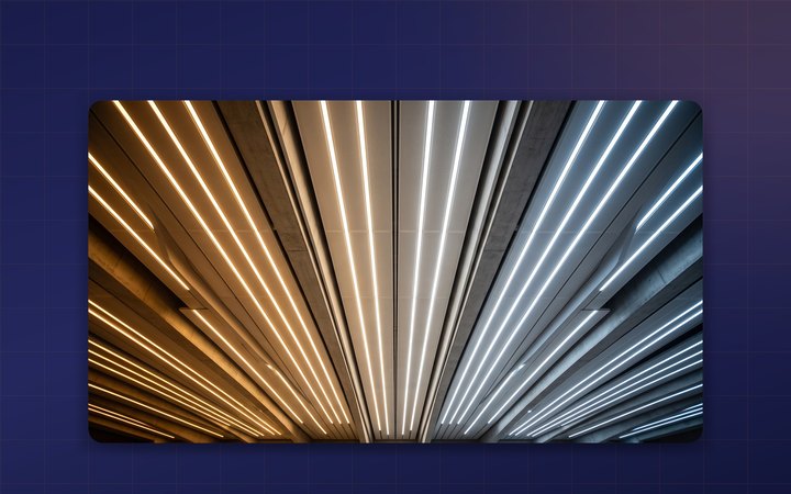Ceiling of linear LED lines shifting from 2700 K warm white on one side to 6500 K cool daylight on the other.