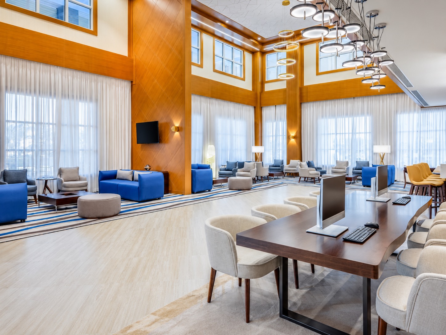 Residence Inn by Marriott Dammam — double-height lobby and lounge interior